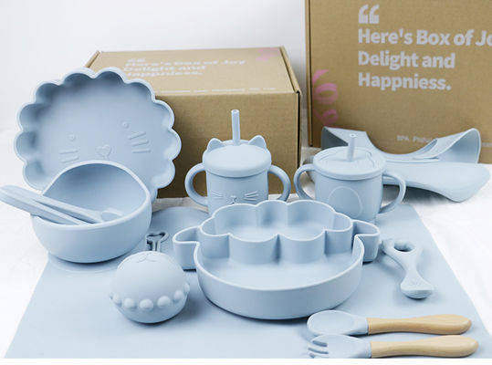 Le bébé en gros Geschirr a mené le produit de alimentation d'ensemble de vaisselle de bébé de silicone de plat de cuvette de cuillère de cuvette de cuillère de bavoir de silicone de sevrage