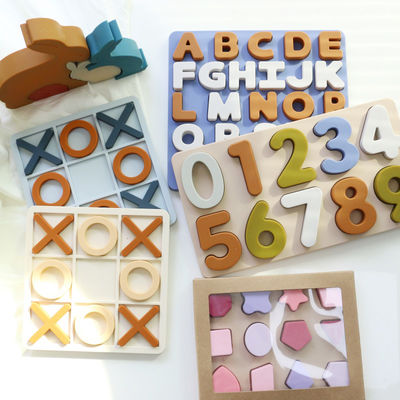 En gros Puzzles en silicone XO entiers Logo personnalisé Marque de jouets de puzzles en silicone éducatifs pour bébés
