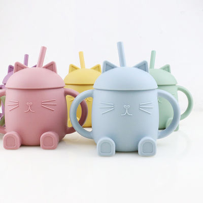 Les enfants portatifs de silicone de catégorie comestible mettent en forme de tasse Cat Style For Infant Training non toxique