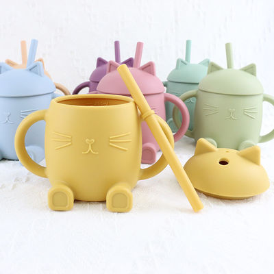 Les enfants portatifs de silicone de catégorie comestible mettent en forme de tasse Cat Style For Infant Training non toxique