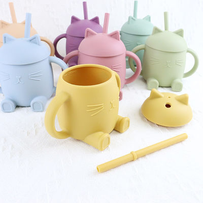 Les enfants portatifs de silicone de catégorie comestible mettent en forme de tasse Cat Style For Infant Training non toxique