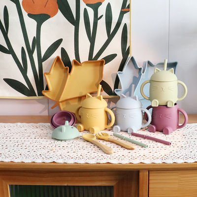 Les enfants portatifs de silicone de catégorie comestible mettent en forme de tasse Cat Style For Infant Training non toxique