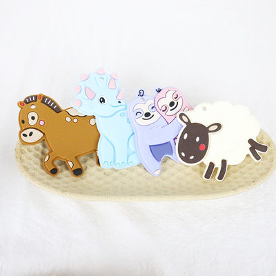 Silicone personnalisé par bébé coloré Teether avec le cheval Dino Shape de moutons