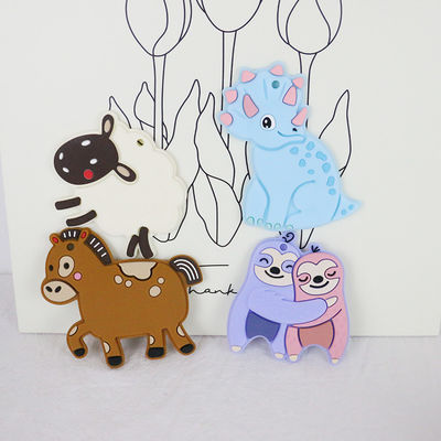Silicone personnalisé par bébé coloré Teether avec le cheval Dino Shape de moutons