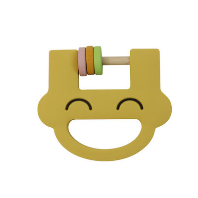 Le hochet mignon Teether de silicone de jouets d'enfants de silicone de visage de sourire avec adaptent l'ODM aux besoins du client d'OEM de logo