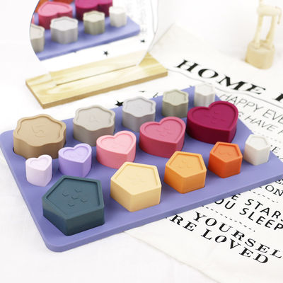 Puzzle de silicone d'enfant en bas âge de bébé non toxique avec la forme de fleur de coeur d'étoile