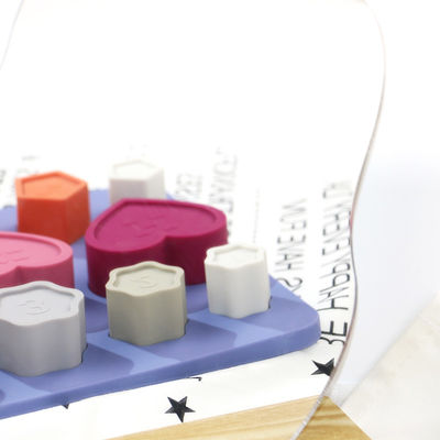 Puzzle de silicone d'enfant en bas âge de bébé non toxique avec la forme de fleur de coeur d'étoile