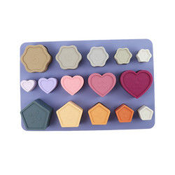 Puzzle de silicone d'enfant en bas âge de bébé non toxique avec la forme de fleur de coeur d'étoile