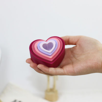 Silicone éducatif d'enfant en bas âge empilant des blocs avec la forme de fleur de coeur d'étoile