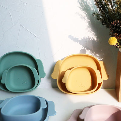 Le silicone d'enfant en bas âge de forme de chien plaque catégorie comestible écologique non toxique