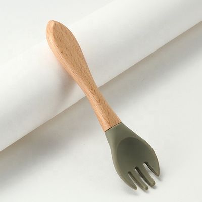 Catégorie comestible les fourchettes et les cuillères de silicone résistantes à la chaleur avec la poignée en bois