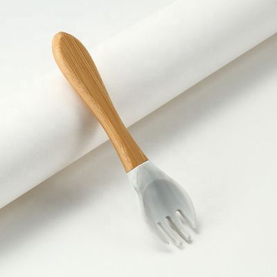 Catégorie comestible les fourchettes et les cuillères de silicone résistantes à la chaleur avec la poignée en bois