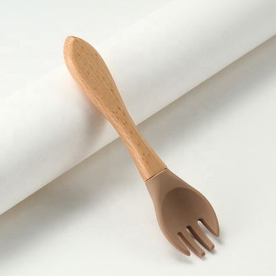 Catégorie comestible les fourchettes et les cuillères de silicone résistantes à la chaleur avec la poignée en bois