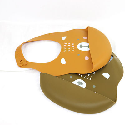 Bavoir imprimé imperméable de silicone d'enfant en bas âge nouveau-né avec le receveur de nourriture non toxique