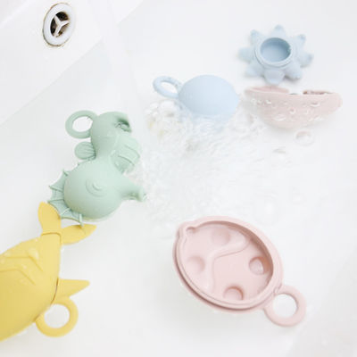 Enfants d'enfants de nouveau venu flottant les jouets libres de l'eau de silicone de dentition de catégorie comestible de bpa de jouets de silicone de bain
