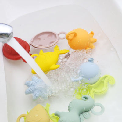 Enfants d'enfants de nouveau venu flottant les jouets libres de l'eau de silicone de dentition de catégorie comestible de bpa de jouets de silicone de bain