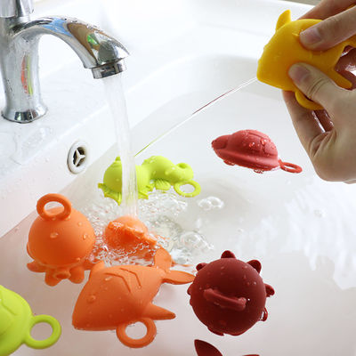 Enfants d'enfants de nouveau venu flottant les jouets libres de l'eau de silicone de dentition de catégorie comestible de bpa de jouets de silicone de bain