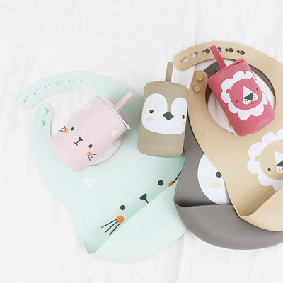 Matériau doux et confortable en silicone pour nourrir le bébé avec un joli dessin animé