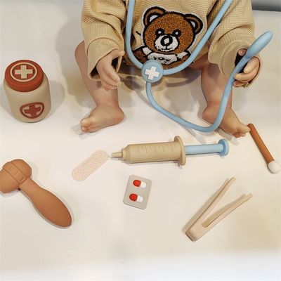 Des jouets médicaux en silicone pour bébé personnalisés comme image parfaite pour le développement sensoriel