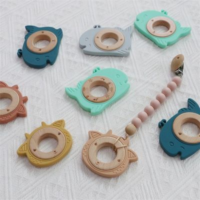 Détecteur de dents de bébé en silicone multifonctionnel avec anneau en bois à motifs animaux