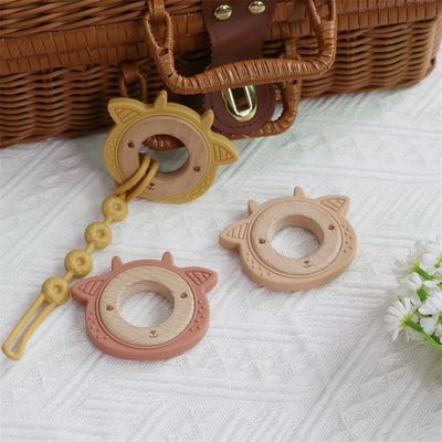 Détecteur de dents de bébé en silicone multifonctionnel avec anneau en bois à motifs animaux