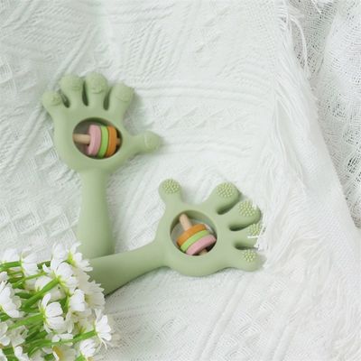 ODM Jouets en silicone pour bébés Groupe d'âge Bébés Enfants Enfants Rattle Forme de paume