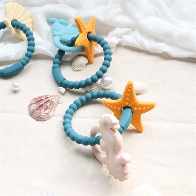 Détecteur de dents de bébé en silicone de qualité alimentaire avec conception non toxique et poignée facile