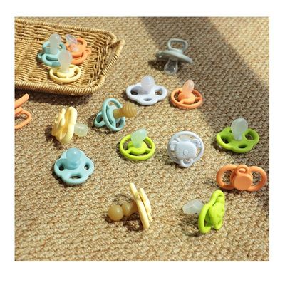 en gros différentes couleurs disponibles en stock livraison rapide sans BPA bébé dentifrice apaisant bébé doux silicone sucette